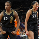 Chelsea Gray #12 and A’ja Wilson #22 of the Las Vegas Aces react after Gray scored and got a foul call against the Connecticut Sun in the third quarter of Game Two of the 2022 WNBA Playoffs finals at Michelob ULTRA Arena on September 13, 2022 in Las Vegas, Nevada. The Aces defeated the Sun 85-71. (Photo by Ethan Miller/Getty Images)